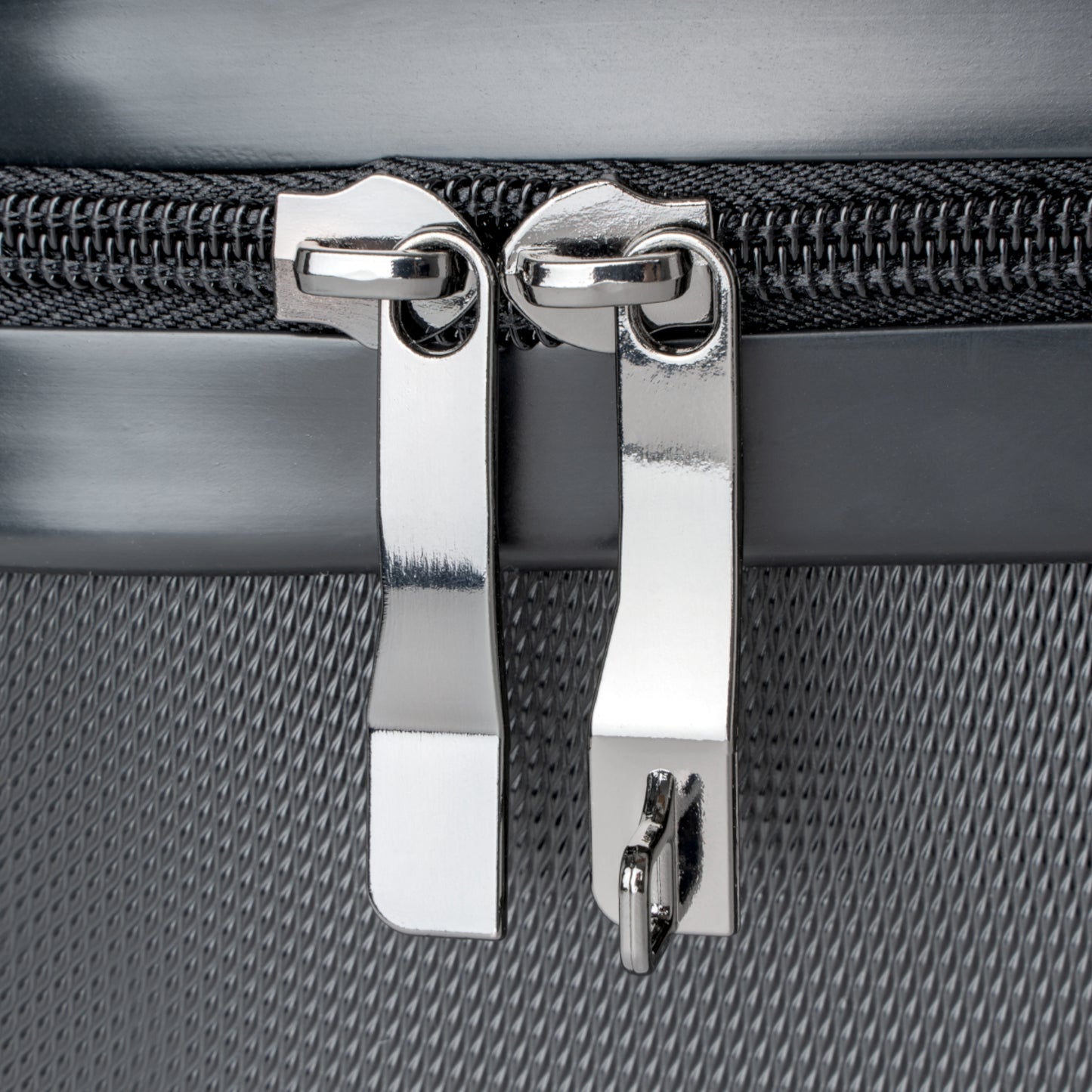 Ah, the quintessential suitcase for the discerning traveler: the “Village Idiot Deluxe.”